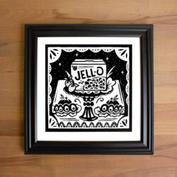 A framed picture of a strawberry Jell-O screen print.