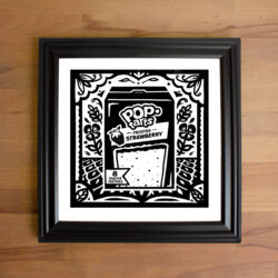 Framed picture of a black and white Pop_Tart print.